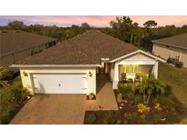 Beautiful one-story home with landscaped yard at 42115 Edgewater Dr, Punta Gorda, FL 33982