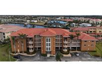 Aerial view of La Rosanna, a condo building with a pool and waterfront access at 3322 Purple Martin Dr # 126, Punta Gorda, FL 33950
