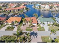 Luxury waterfront home with private driveway and canal views in a prestigious community at 1460 Raven Ct, Punta Gorda, FL 33950