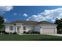Single-story home with attached garage and landscaping at 5394 Sturrup St, North Port, FL 34291