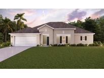 Single-story home with a two-car garage and landscaped lawn at 203 Uruguay Dr, Punta Gorda, FL 33983