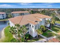 Luxury condo community with lake views and resort-style amenities at 1000 San Lino Cir # 1011, Venice, FL 34292