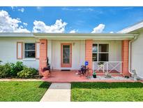 Florida Ranch home with carport and palm trees at 544 Lindley Ter, Port Charlotte, FL 33952