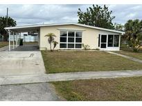 Ranch style home with carport and spacious yard at 21242 Glendale Ave, Port Charlotte, FL 33952