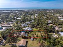 Aerial view showing home's large lot and location at 1651 Maria St, Englewood, FL 34223