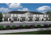 New townhome community, featuring multiple units with attached garages and landscaping at 2787 Walden Town Cir, Plant City, FL 33566