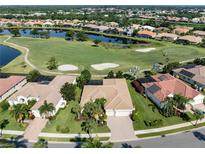 Luxury home with golf course and water views in a gated community at 523 Sawgrass Bridge Rd, Venice, FL 34292