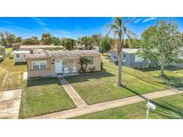 Cute 2-bedroom, 1-bath home with a fenced yard and a carport at 8333 Herbison Ave, North Port, FL 34287