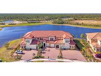 Luxury waterfront townhome community; waterfront property with lake views at 10217 Staggerbush Dr # 202, Venice, FL 34293