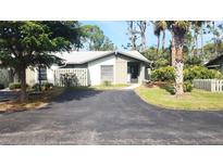 Cute condo with a private fenced yard and driveway at 112 Jose Gaspar Dr # 112, Englewood, FL 34223
