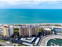Oceanfront condo building with parking and beach access at 840 The Esplanade N # 703, Venice, FL 34285
