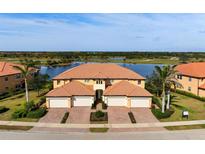Luxury villa community with lake and golf course views at 23499 Awabuki Dr # 102, Venice, FL 34293