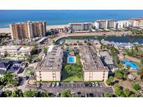 Beautiful beach condo complex with a shared pool and stunning ocean views at 995 Laguna Drive # 303, Venice, FL 34285