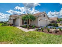 Charming single Gathering home with a well manicured lawn, and two car garage at 5371 White Ibis Dr, North Port, FL 34287