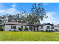 Charming ranch home with a well-manicured lawn at 5818 18Th S Ave, Gulfport, FL 33707