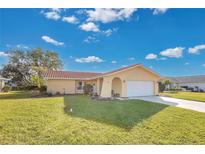 Cute ranch home with a large yard and terracotta roof at 7213 19Th W Ave, Bradenton, FL 34209