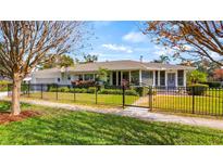 Charming ranch home with a fenced yard and mature trees at 105 17Th Ne Ave, St Petersburg, FL 33704