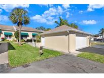 Attached garage with ample parking space at 6650 100Th N Way # 25C, St Petersburg, FL 33708