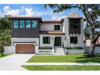 Stunning two-story home with a modern design and attached garage at 3605 S Belcher Dr, Tampa, FL 33629