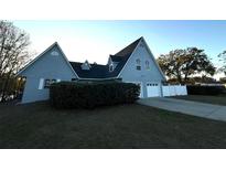 Charming two-story home with a two car garage and mature landscaping at 23310 Cascade Pl, Land O Lakes, FL 34639