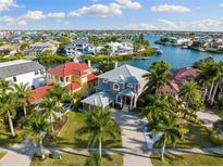 Luxury waterfront home with private dock and stunning canal views at 6301 Marbella Blvd, Apollo Beach, FL 33572