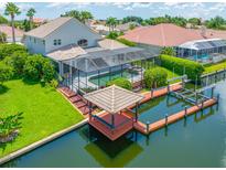 Luxury waterfront home with private pool and dock at 5510 E Longboat Blvd, Tampa, FL 33615