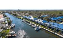 Stunning aerial view of waterfront homes with private docks on a scenic canal at 1661 Watermark Ne Cir, St Petersburg, FL 33702
