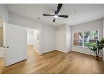 Bright bedroom with hardwood floors and large window at 4207 S Dale Mabry Hwy # 11109, Tampa, FL 33611