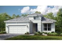 One-story home with gray roof, white walls, and a two-car garage at 4504 Isonzo Way, Wesley Chapel, FL 33543