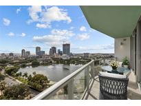 Breathtaking skyline views from the private balcony with comfortable seating and a serene atmosphere at 777 3Rd N Ave # 1504, St Petersburg, FL 33701