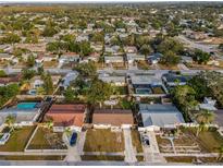 Aerial view showcasing the neighborhood and surrounding area at 1619 Coppertree Dr, Tarpon Springs, FL 34689