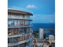 Luxury high-rise with wrap-around terraces overlooking the bay with seating, dining, and city views at 400 Central Ave # 3909, St Petersburg, FL 33701