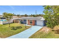 Newly renovated home with solar panels and a spacious yard at 754 Melody Ln, Bradenton, FL 34207