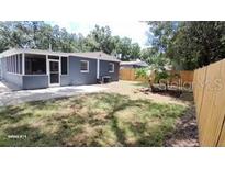 Renovated home with a fenced-in backyard at 4614 Webster St, Tampa, FL 33610