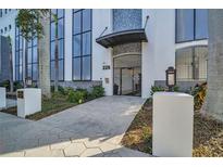 Modern building entrance with landscaped walkway at 226 5Th N Ave # 706, St Petersburg, FL 33701