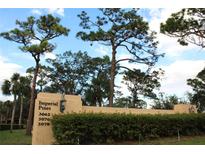 Community entrance sign with building numbers at 3076 Eastland Blvd # 106, Clearwater, FL 33761