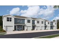 New townhomes boast a modern design with charming curb appeal and attached garages at 4320 Red Banks Ln, Bradenton, FL 34208