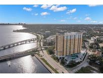 Aerial view of a luxury highrise condo building near a waterfront at 345 Bayshore Blvd # 308, Tampa, FL 33606