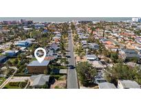 Aerial view of a modern home near the beach, showcasing its unique design and desirable location at 275 44Th Ave, St Pete Beach, FL 33706