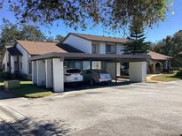 Charming home featuring a covered carport, providing convenient parking and protection from the elements at 1808 Cypress Trace Dr # 1808, Safety Harbor, FL 34695