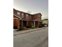 Attractive three-story townhome with landscaping at 2066 Sun Down Dr 2066 Sun Down Dr, Clearwater, FL 33763