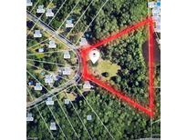 Aerial view of a triangular lot with surrounding properties at 10960 Echo Loop, New Port Richey, FL 34654