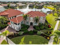 Luxury waterfront home with a large lot and stunning landscaping at 1414 Alhambra Dr, Apollo Beach, FL 33572