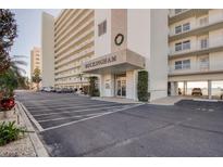 Buckingham building exterior, featuring parking and waterfront views at 6060 Shore S Blvd # 601, Gulfport, FL 33707