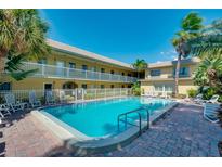 Inviting pool area with lounge chairs, offering a relaxing retreat at 600 71St Ave # 17, St Pete Beach, FL 33706