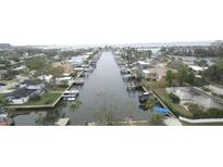 Aerial view of waterfront homes and canal at 4008 Dana Shores Dr, Tampa, FL 33634