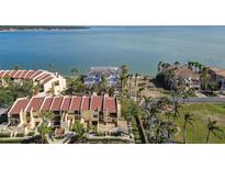 Waterfront property with luxury homes and tropical landscaping at 7550 Sunshine Skyway S Ln # T48, St Petersburg, FL 33711