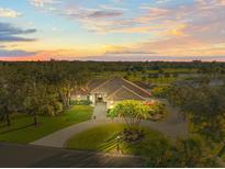 Luxury home on golf course with circular driveway at 4098 Las Palmas Way, Sarasota, FL 34238