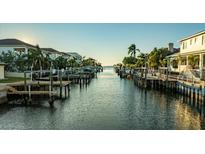Scenic waterfront view of a canal with boats and luxury homes at 4927 W San Rafael St, Tampa, FL 33629