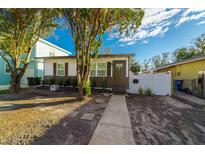 Charming single story home with landscaped yard and walkway at 2942 24Th N Ave, St Petersburg, FL 33713